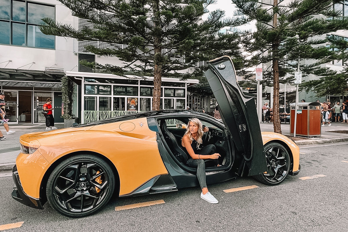 Rachael Reid in a Maserati MC20 (image supplied)