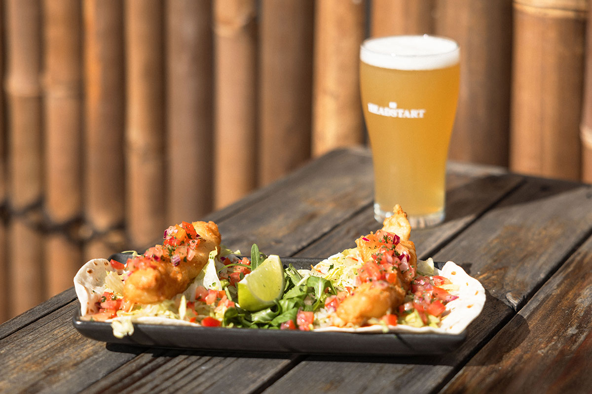 Fish Tacos and beer at Pretty Handsome, Miami (Image: © 2024 Inside Gold Coast)